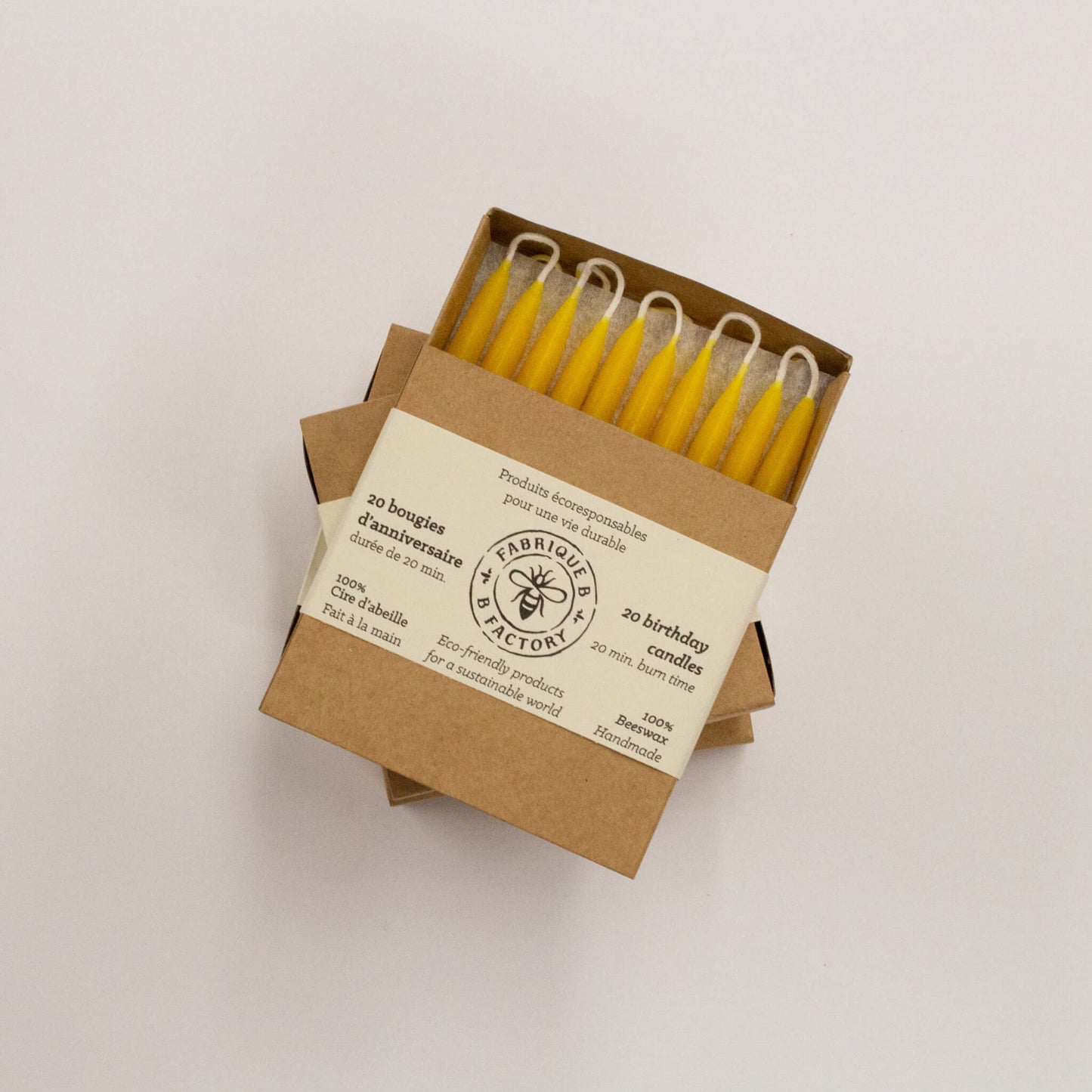Pack of 20 eco-friendly beeswax birthday candles in gift box with B Factory logo on lid