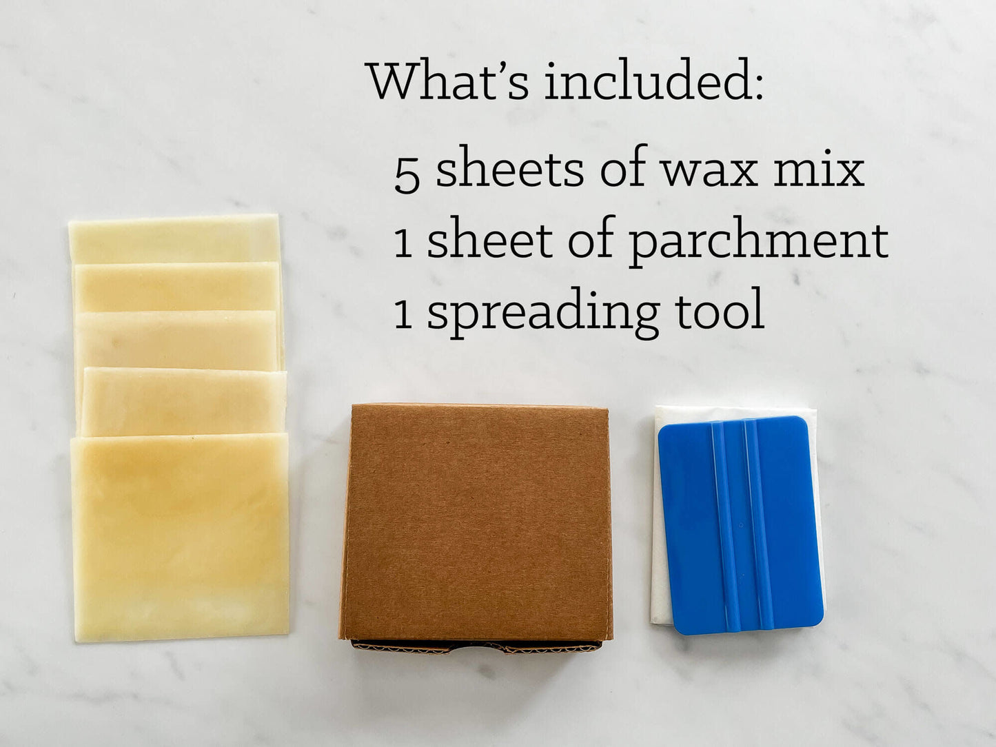 DIY beeswax food wrap kit with 5 beeswax sheets, 1 piece of parchment paper, and spreading tool