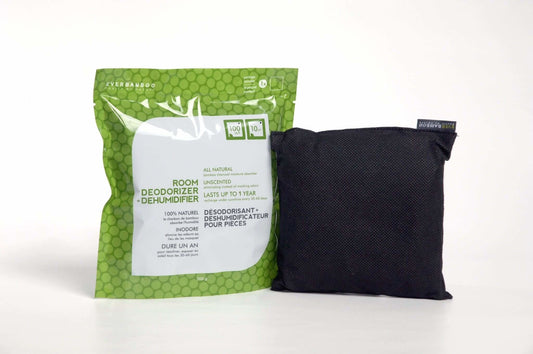 All-natural bamboo charcoal pouch in front of Ever Bamboo room deodorizer and dehumidifier packaging