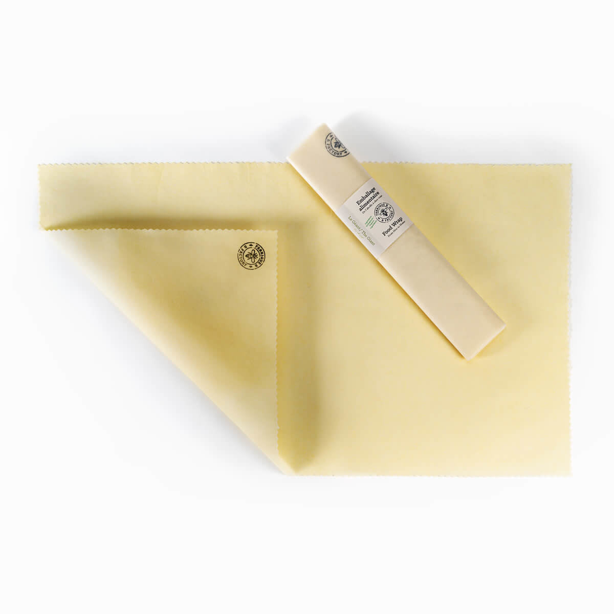 Giant reusable beeswax wrap with B Factory logo on bottom-left corner