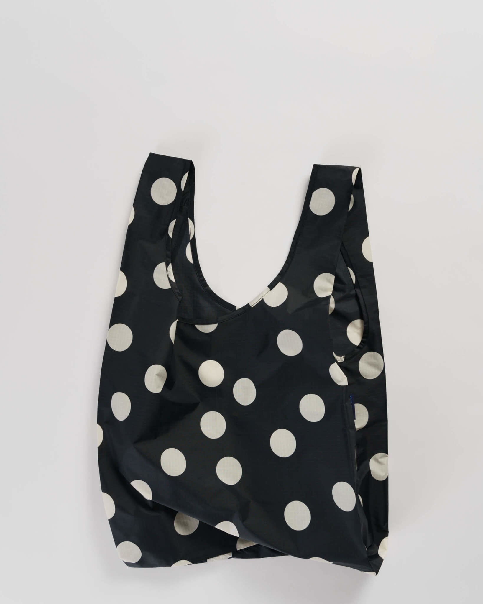 Reusable shopping bag with white polka-dot pattern